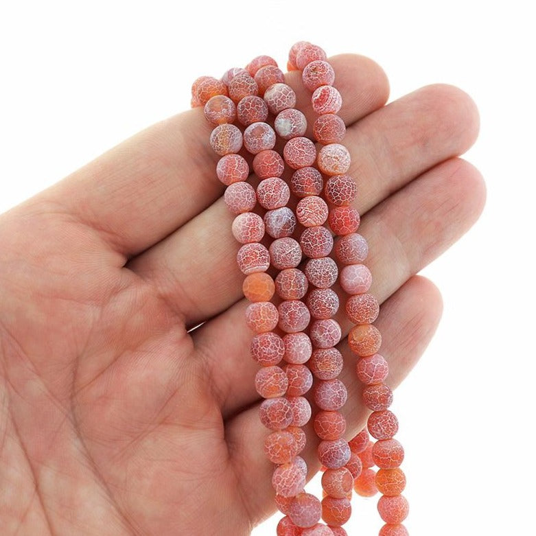 Perles rondes en agate naturelle 6 mm - Craquelé patiné rose vif - 1 brin 62 perles - BD2455