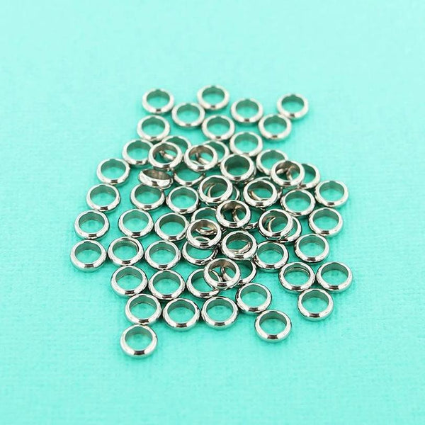 Flat Round Stainless Steel Spacer Beads 7mm x 2.5mm - Silver Tone - 10 Beads - FD525