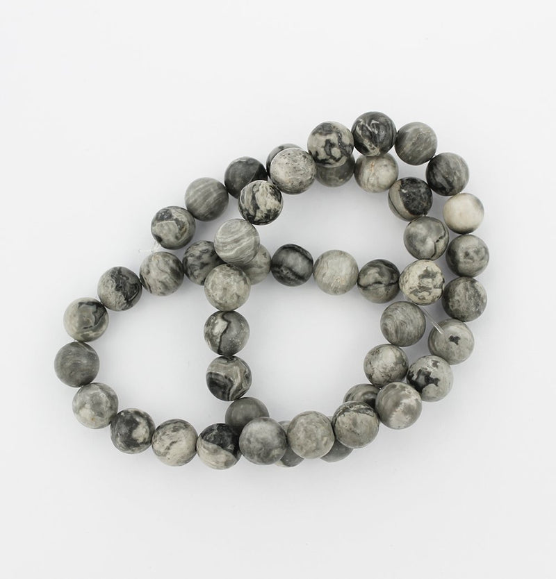 Perles rondes en jaspe naturel Picasso 6 mm - Marbre gris orageux - 1 brin 61 perles - BD745