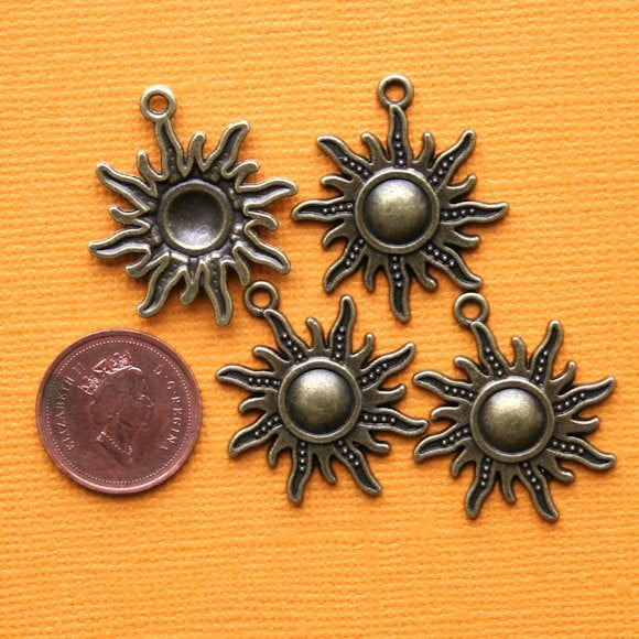 5 Sun Antique Bronze Tone Charms - BC478