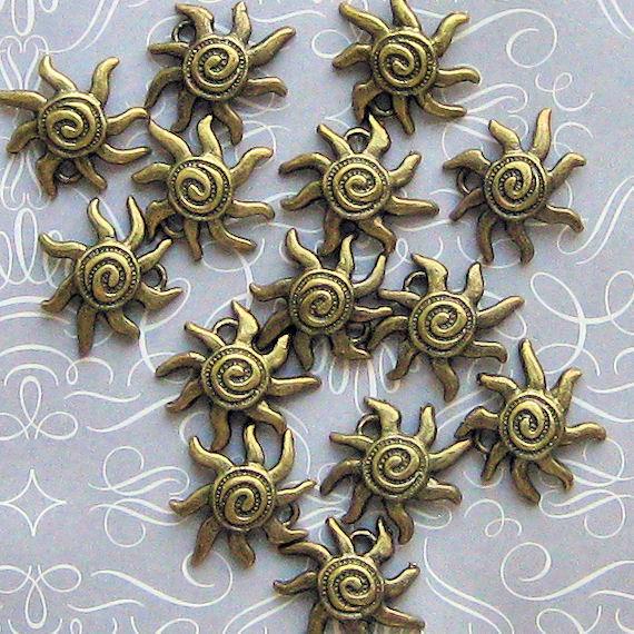 8 Sun Antique Bronze Tone Charms - BC213