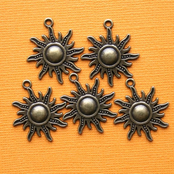 5 Sun Antique Bronze Tone Charms - BC478