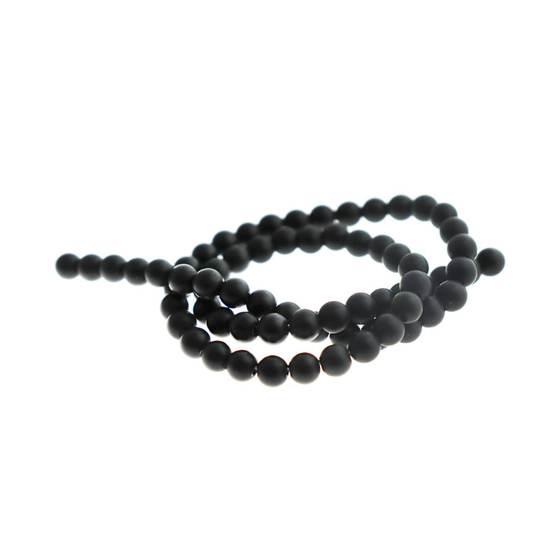 Perles rondes en pierre synthétique 4 mm ou 6 mm - Choisissez votre taille - Noir - 1 brin complet - BD2577